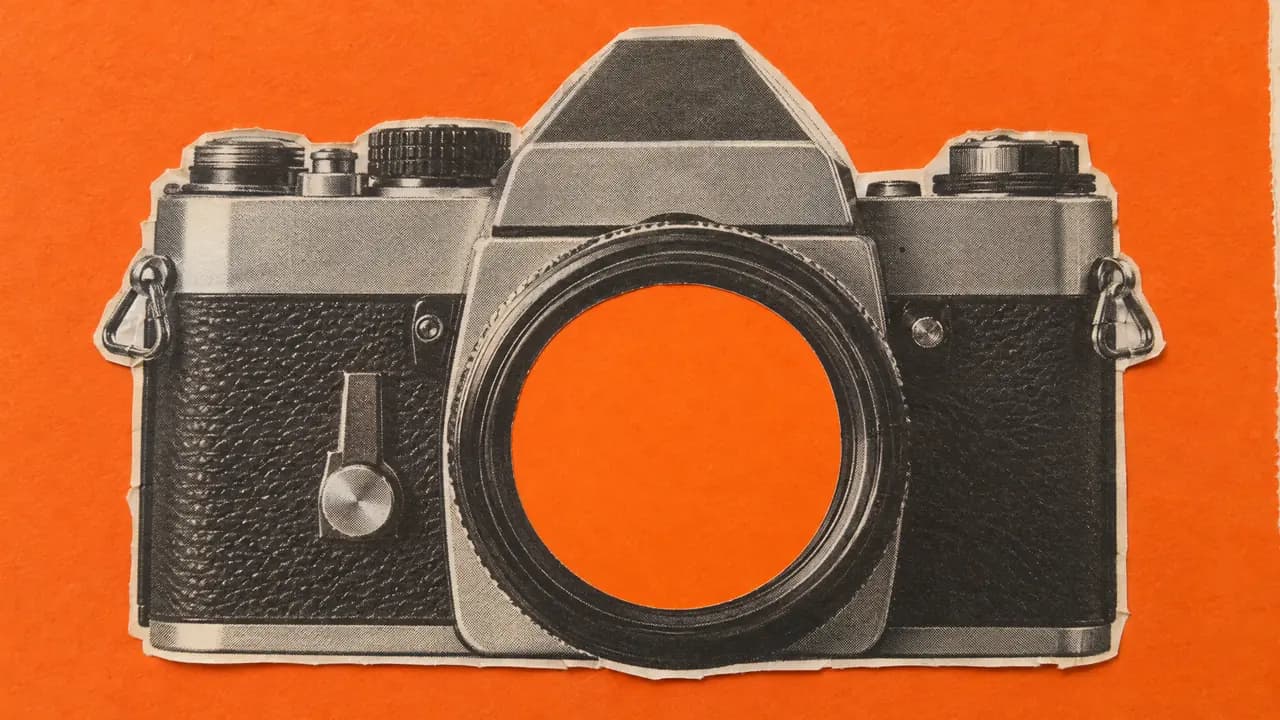 Collage of a black-and-white photo of a vintage film camera seen from the front, its lens an orange paper circle