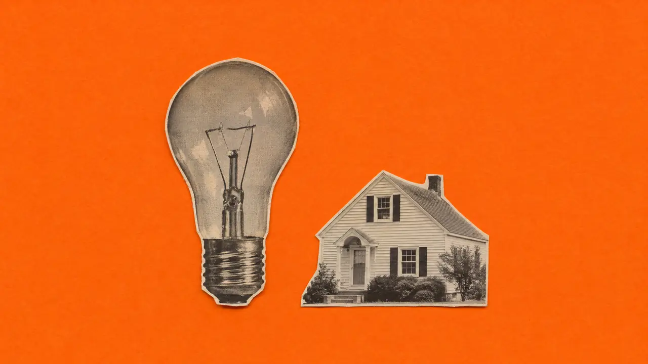 Collage of a vintage magazine photo of an old light bulb standing beside a small cut-out house, with orange paper