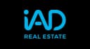 Logo de iad, agencia inmobiliaria