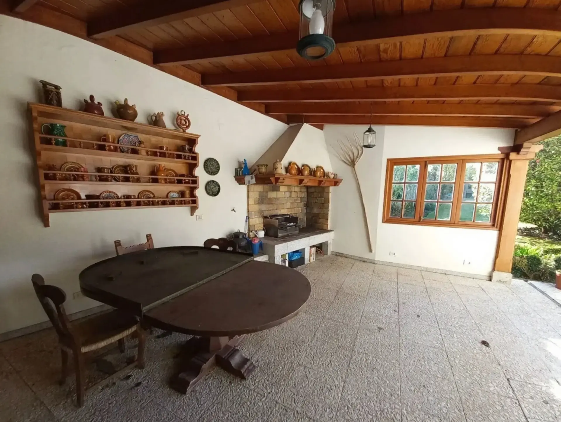 Antes: Terraza con muebles y decoración originales